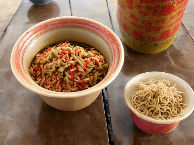 一碗面里的城市记忆麻将胡了武汉热干面